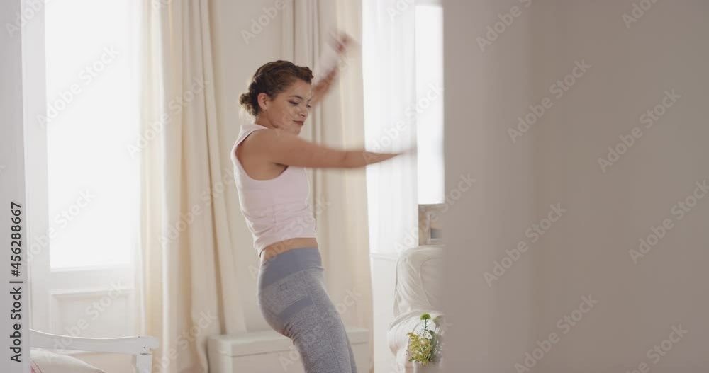 young woman dancer having fun practicing cool hip hop dance moves at home celebrating enjoying dancing 4k young woman dancer having fun practicing cool hip hop dance moves at home celebrating enjoying dancing 4k