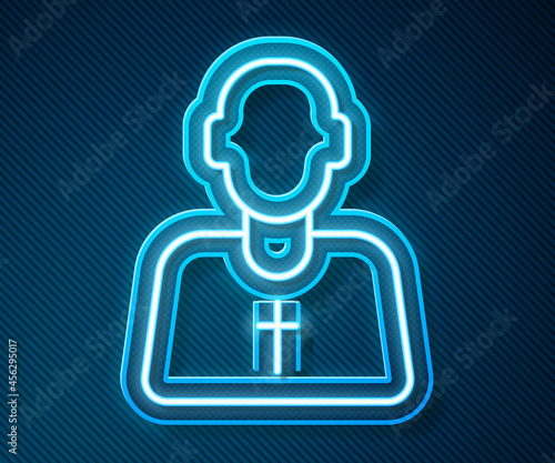 Glowing neon line Priest icon isolated on blue background. Vector