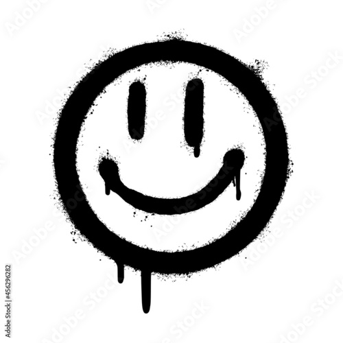 Fototapeta graffiti smiling face emoticon sprayed isolated on white background. vector illustration.