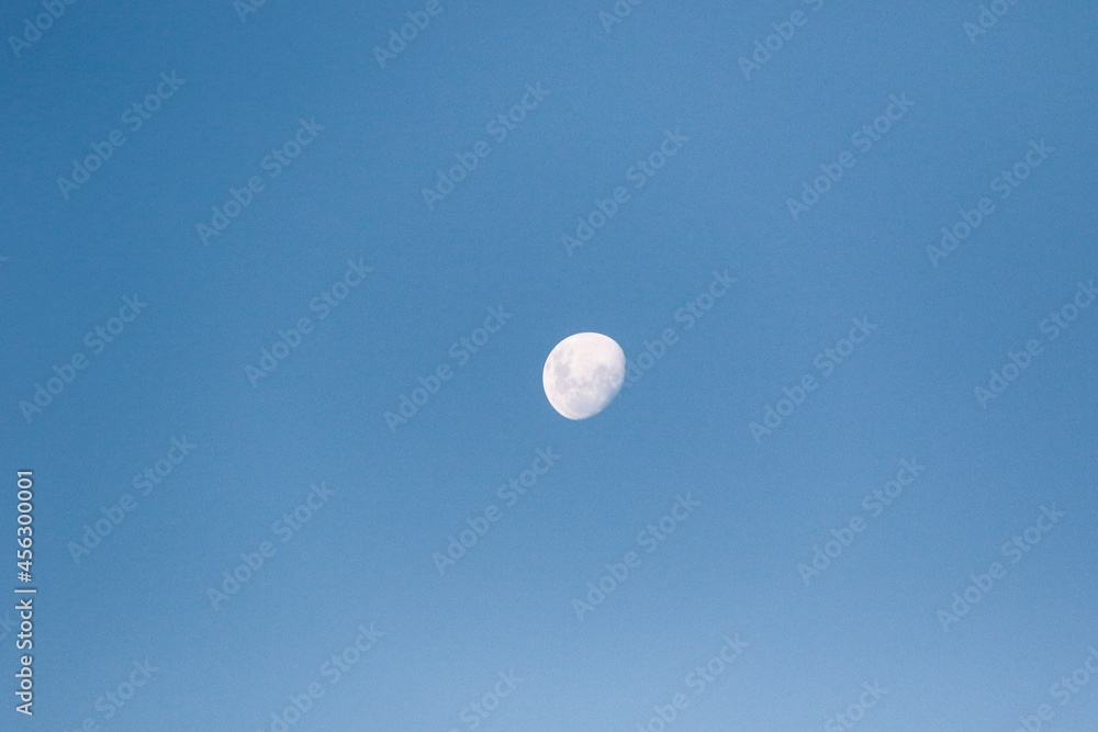 Moon in the sky during a clear and cloudless day in Johannesburg South Africa Moon in the sky during a clear and cloudless day in Johannesburg South Africa