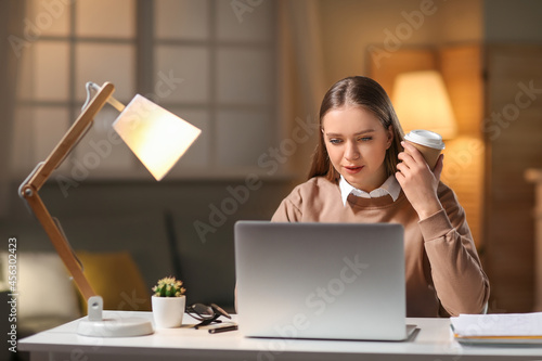 Young woman working on lapt...