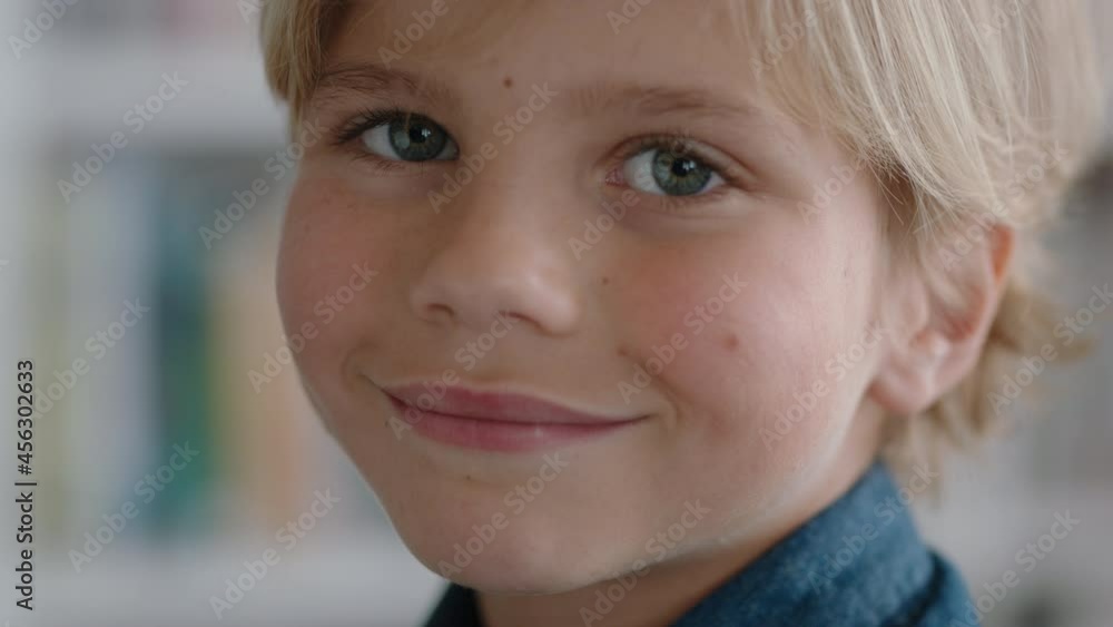 portrait happy little boy smiling with natural childhood curiosity looking joyful child with innocent playful expression 4k footage portrait happy little boy smiling with natural childhood curiosity looking joyful child with innocent playful expression 4k footage