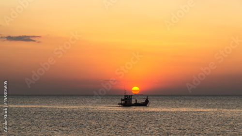 Large fishing boat going out for a sunset cruise