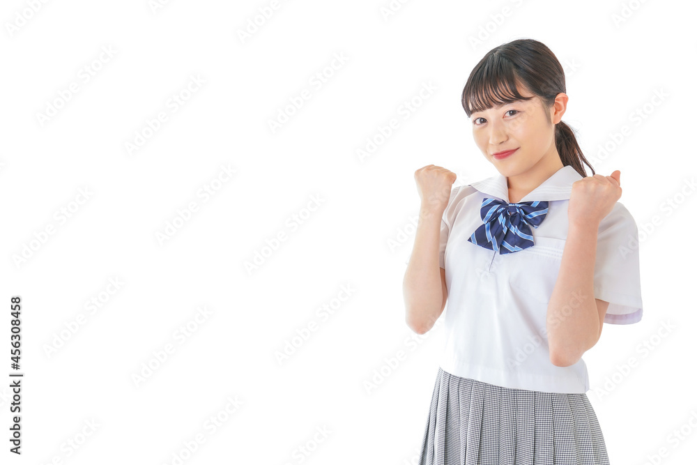 ガッツポーズをする笑顔の女子学生