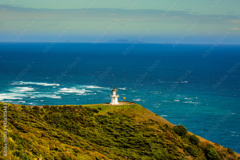 In the distance on the horizon you can see the Three Kings Islands sometimes known collectively by the Māori name for the largest island, Manawatāwhi.