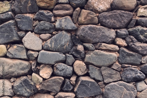 Natural stone wall. Full frame texture. © Hernan Schmidt