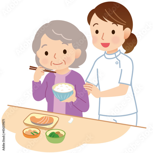 食事をする高齢者　食事介助　看護師