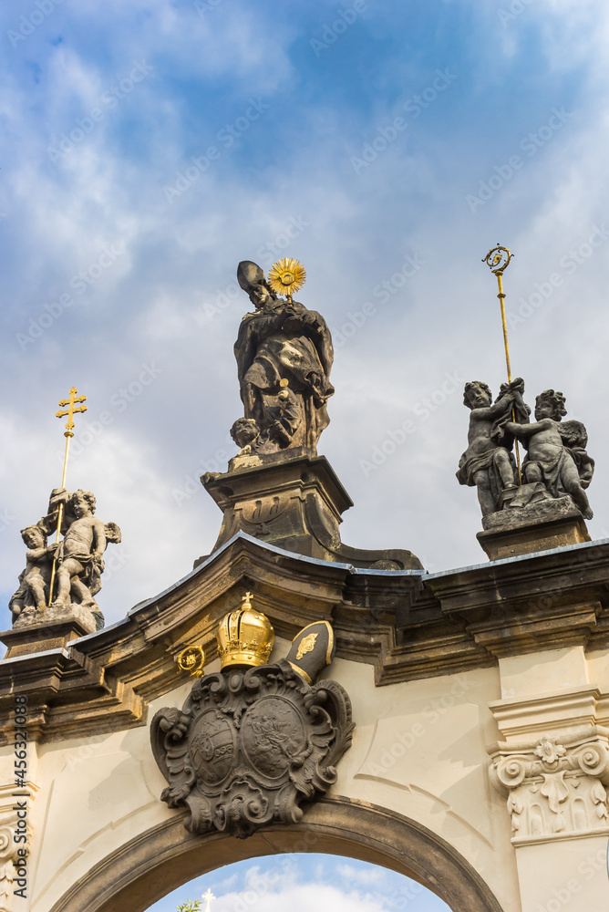 Statues on the entrance gate of the Strahov Monastery in Prague, Czech Republic