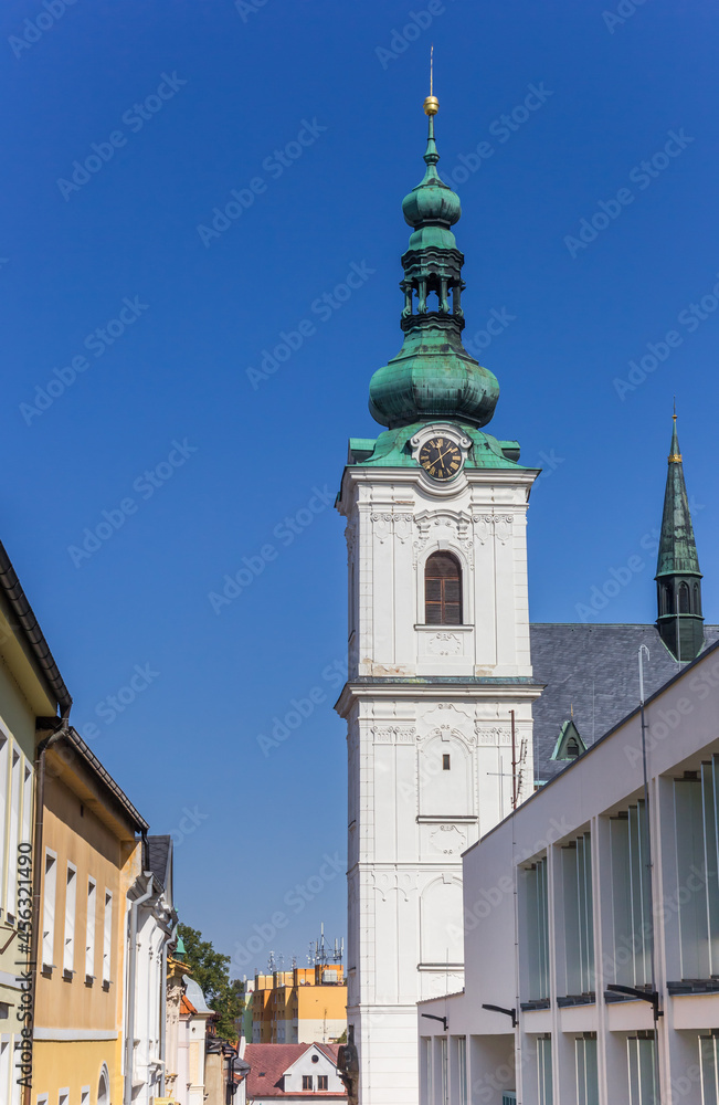 Fototapeta premium White tower and historic houses in Klatovy, Czech Republic