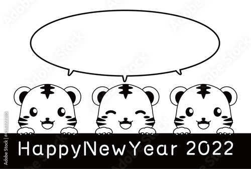 モノクロのひょっこり顔を出すトラとHappy New Yearの文字と吹き出しの2022年の年賀状