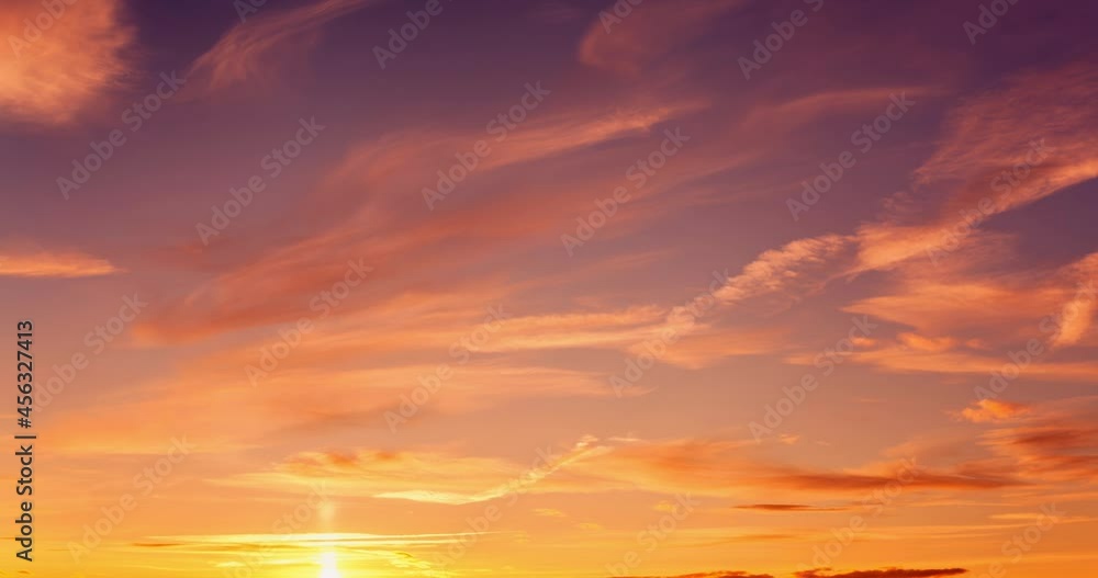 Orange and violet sky calm timelapse. Sunset play of contrasting colors. Natural time lapse background of gradients in motion. Sense of dynamic energy. Skyline in autumnal colours. Orange and violet sky calm timelapse. Sunset play of contrasting colors. Natural time lapse background of gradients in motion. Sense of dynamic energy. Skyline in autumnal colours.