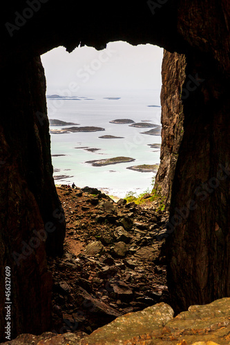 Torghatten cave with a view at the norwegian archipelago