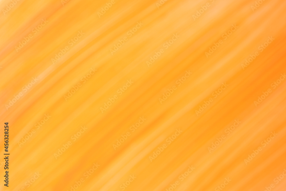 Blurred dark yellow and orange backgroundn. Defocused art abstract golden gradient backdrop.