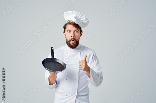 bearded man chef pan cooking kitchen culinary industry