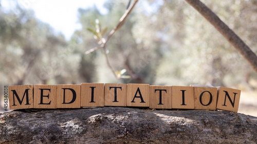 The word meditation was created from wooden blocks. Health and life.