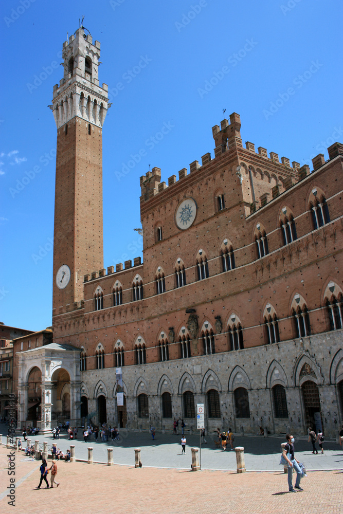 the medieval Piazza del Campo di Siena and the civic tower of the town hall