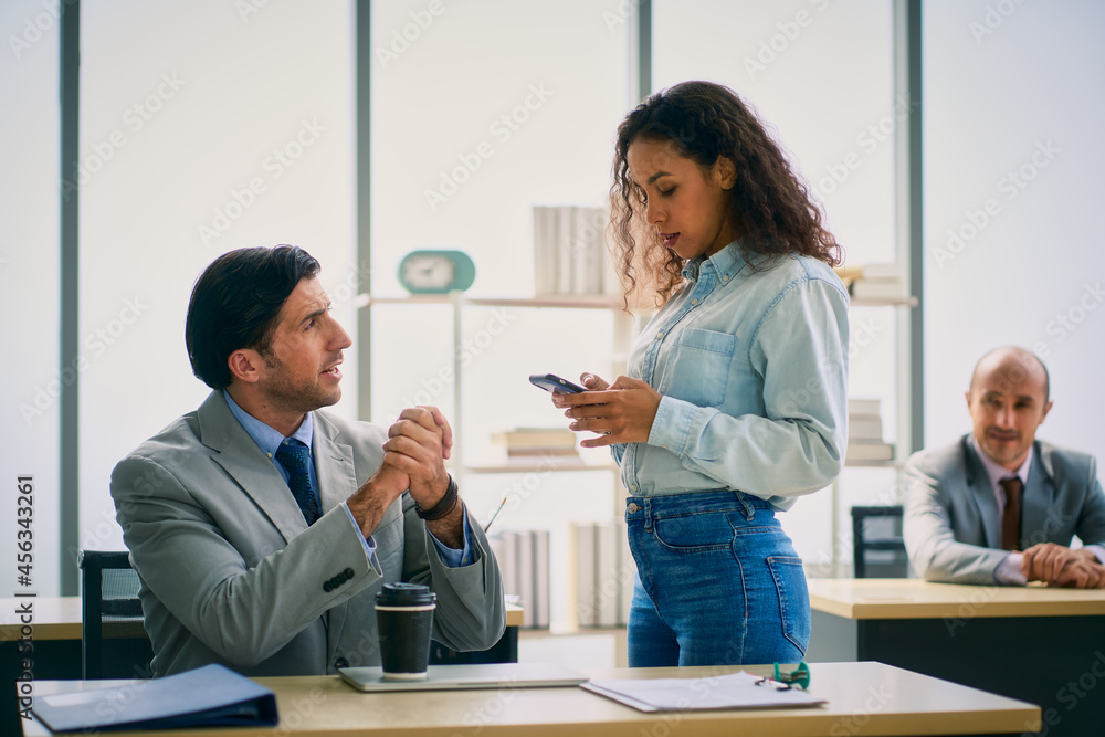 Businessman and woman talking in working space in office , Business teamwork concept Businessman and woman talking in working space in office , Business teamwork concept