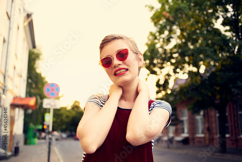 pretty woman wearing sunglasses outdoors lifestyle fashion posing © SHOTPRIME STUDIO