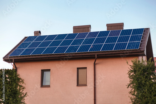 Private house with solar panels on the roof. 
