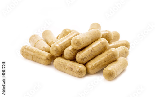 Group of brown herbal supplement capsules for health
