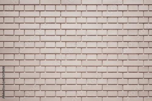 Luxury pink brick wall texture background. Close up of stylish brick wall. 