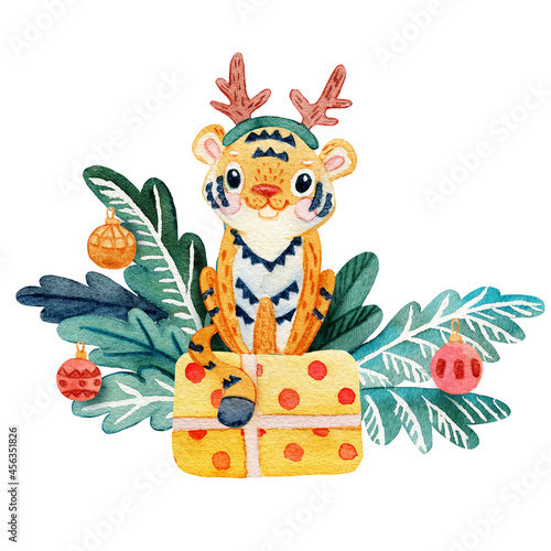 Cute tiger with deer horns sitting on the present box. Christmas decoration for postcards, banners and kids apparel