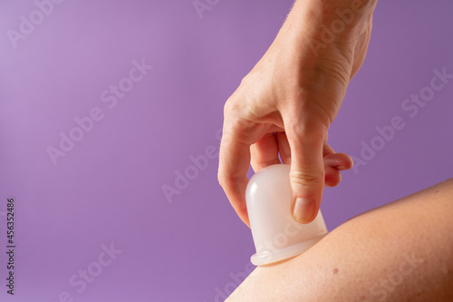 Self-cupping therapy. Anti-cellulite massage with a vacuum cup. Vacuum jar massage. Silicone jars for vacuum therapy.