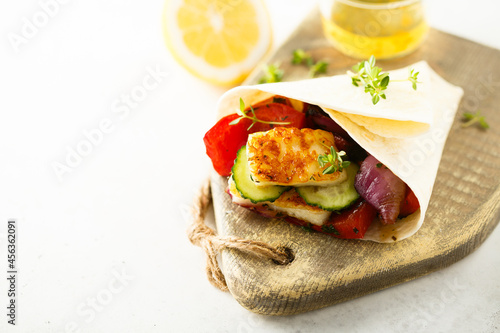 Grilled halloumi roll with vegetables photo