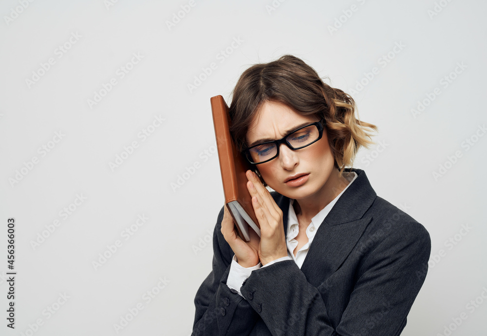 woman in business suit notebook in hand Job Professional