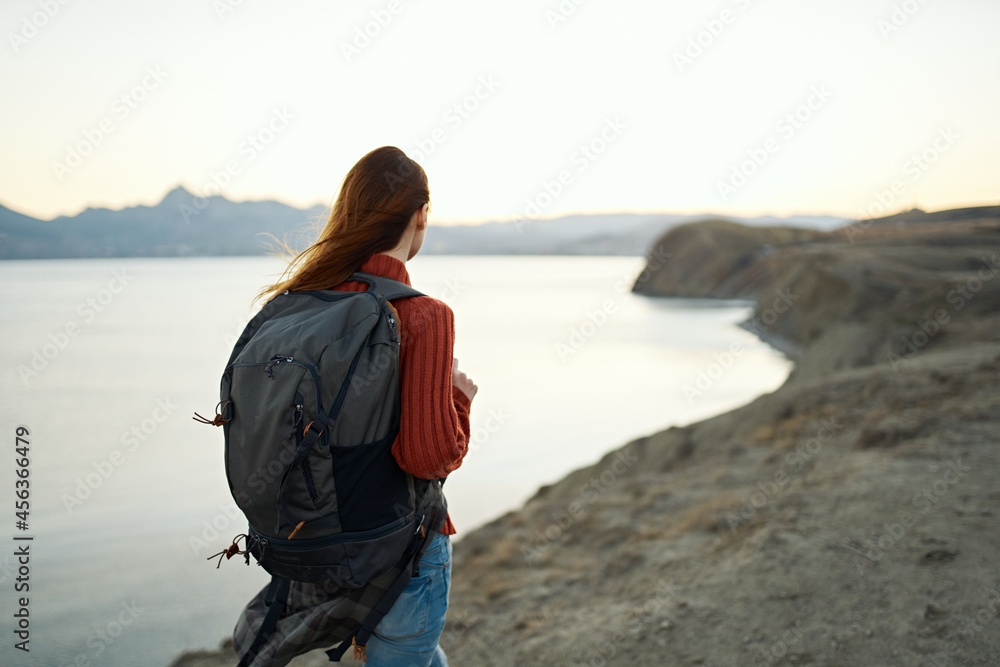 woman with law after tough landscape mountains vacation