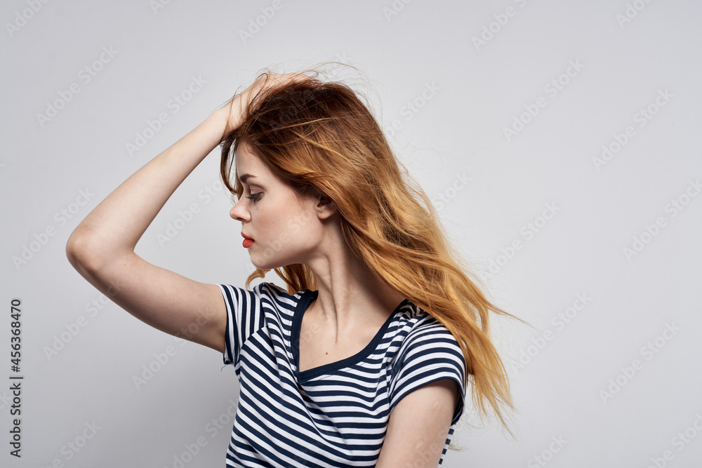 cheerful woman holding hair makeup posing fun fashion isolated background cheerful woman holding hair makeup posing fun fashion isolated background