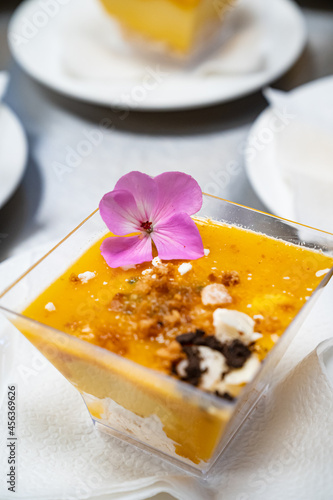 Catering. kremenki with fruit desserts decorated with flowers.  photo