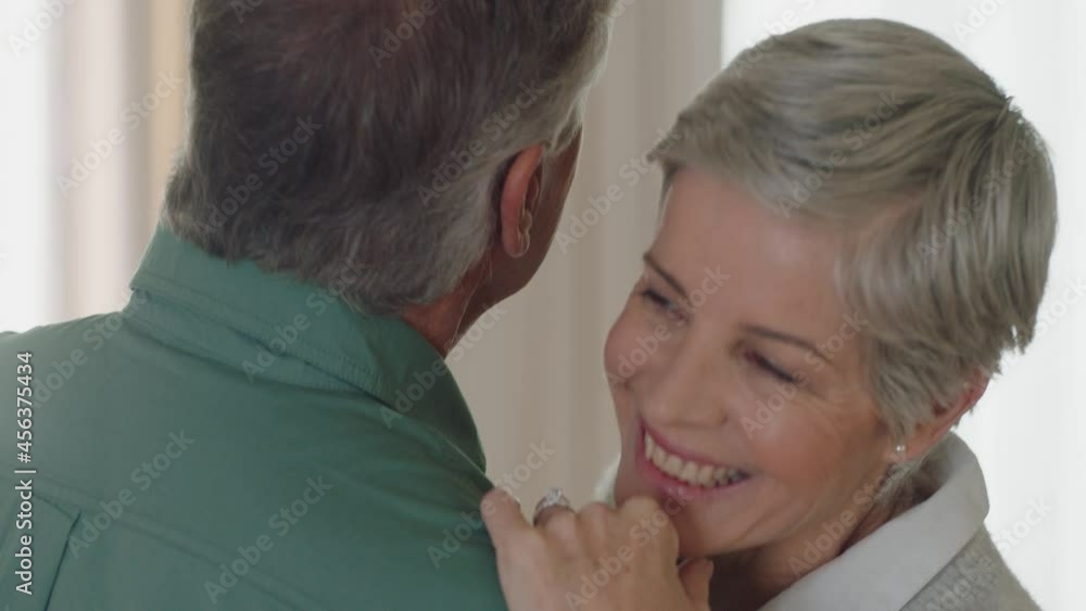 happy mature couple dancing at home enjoying romantic dance together celebrating relationship milestone having peaceful retirement 4k happy mature couple dancing at home enjoying romantic dance together celebrating relationship milestone having peaceful retirement 4k