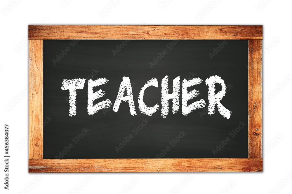 TEACHER text written on wooden frame school blackboard. TEACHER text written on wooden frame school blackboard.