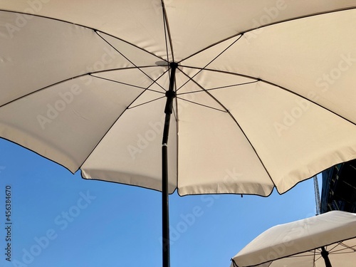beach umbrella by the pool © Polina
