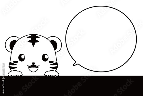 モノクロのひょっこり顔を出すトラのイラストと吹き出しの年賀状向けの素材