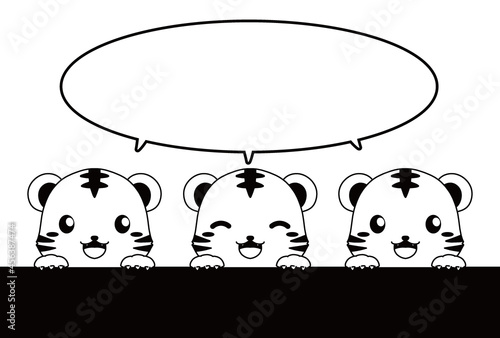 モノクロの ひょっこり顔を出すトラのイラストと吹き出しの年賀状向けの素材