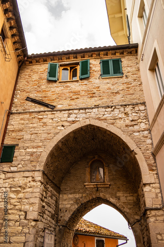 Gothic arch of the entrance door in the village of Sirolo  Marche - Italy
