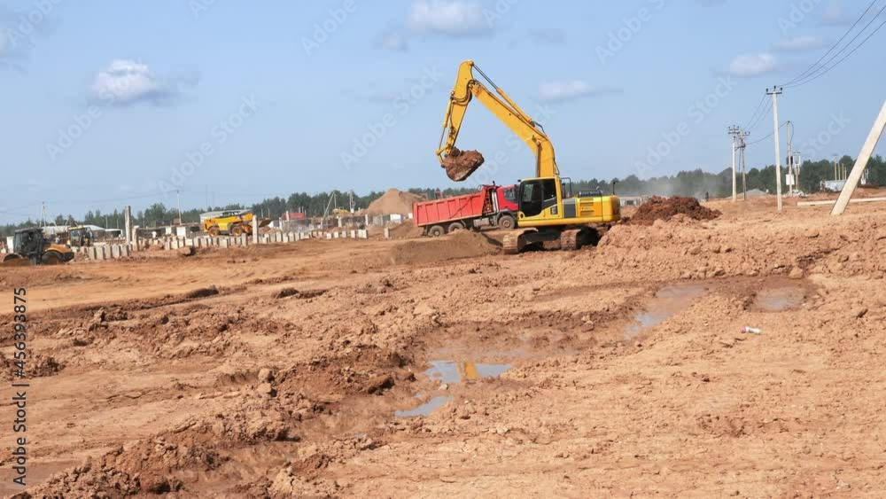 custom made wallpaper toronto digitalVideo shot of тrucks transporting soil for leveling construction site of meat processing plant
