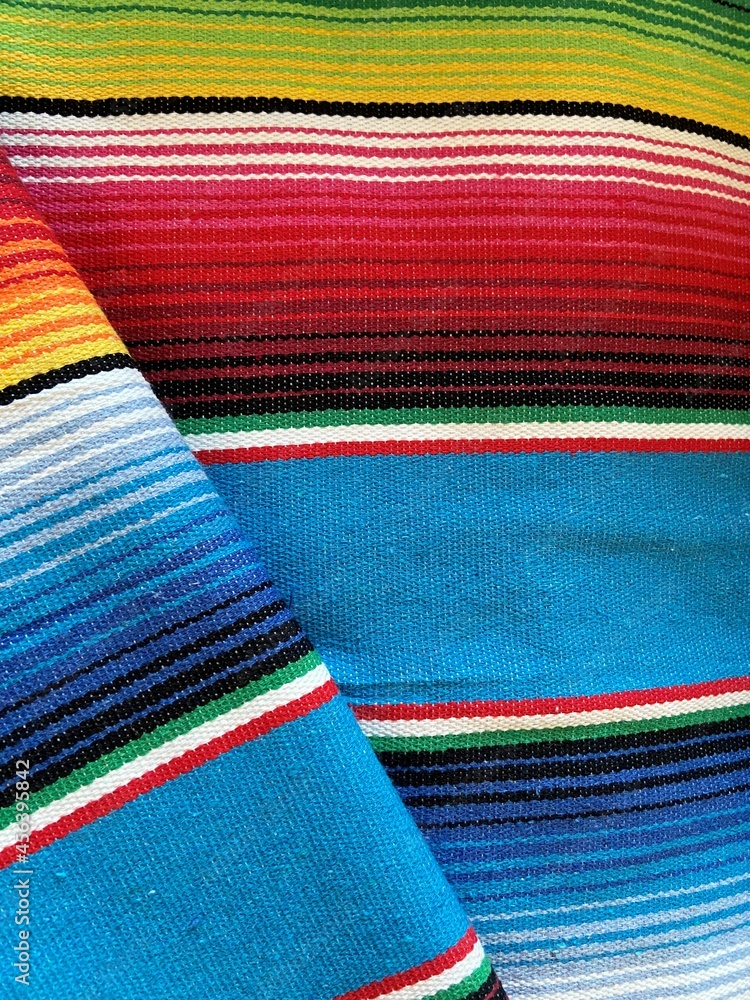 poncho Mexican cinco de mayo rug blanket serape fiesta traditional Mexico poncho background Mexican stripes copy space blanket minimal simple cinco de mayo serape pattern background - stock photo poncho Mexican cinco de mayo rug blanket serape fiesta traditional Mexico poncho background Mexican stripes copy space blanket minimal simple cinco de mayo serape pattern background - stock photo