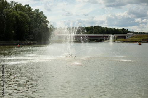 Fountains in the lake. Park infrastructure.
