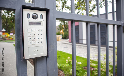 Video intercom on the gate at the entrance to the residential area. Electronic intercom to a private area. closed residential yard.