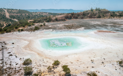 Open pit of old copper mine with dried polluted lake bed in Limni, Cyprus. Aerial landscape