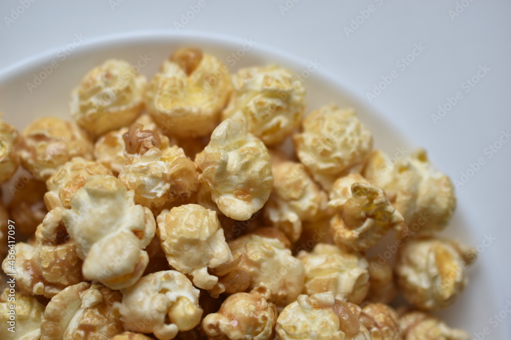 Popcorn covered with icing and caramel with sugar
