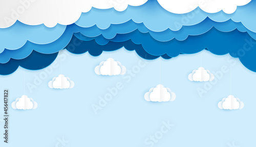 Beautiful fluffy blue clouds paper cut art style. Place for text. vector design
