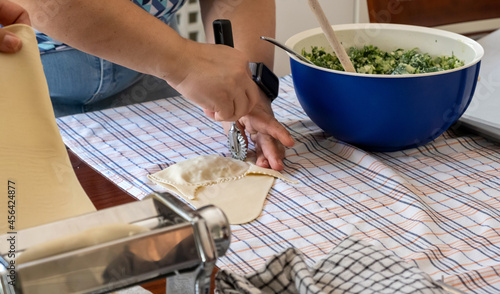 Kalitsounia preparation concept. Dough for kaltsounia and filling ingredients background.