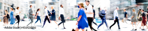 Walking people blur wide background. Lots of people walking in the City. Business concept illustration, business people, modern life style