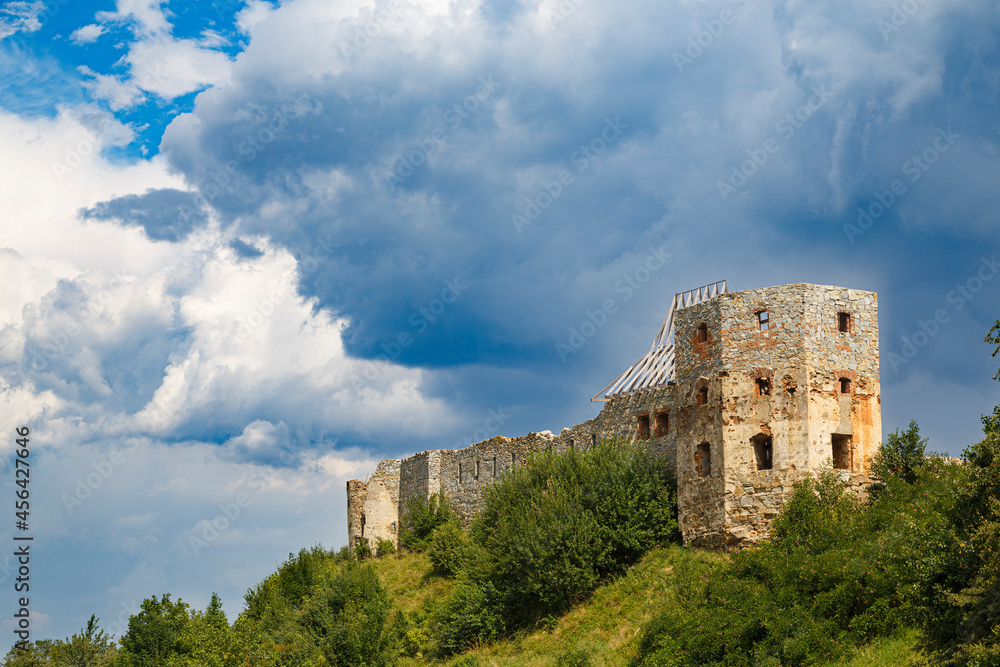 Ancient ruined Pniv castle outdoor, on hill, western Ukraine. Ukrainian architectural  landmark.