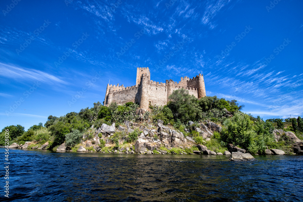 A view of the beautiful Almourol Castle located on a small island on the middle of the Tagus river, Portugal.