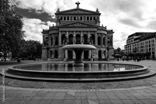 frontal view of the old opera building at dawn in Frankfurt, Germany